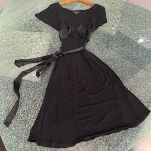 Black short sleeve dress with low V-neck